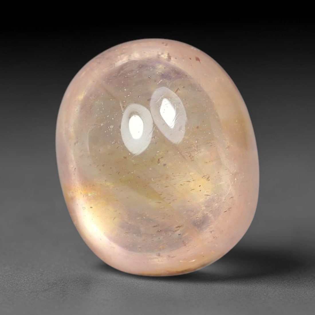 2.49ct Natural Sri Lankan Padparadscha Sapphire Loose Gemstone, 77BF: This fully polished Padparadscha sapphire features soft warm peach-orange blended body tone, with faint natural mineral traces scattered throughout its crystalline interior, measured at calibrated dim