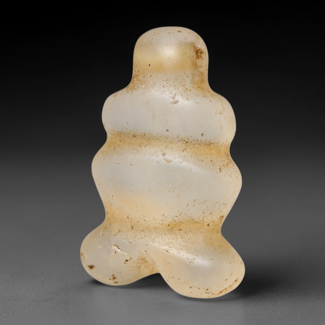 Ancient Medieval Coptic Christian Egyptian Culture Rock Crystal Amulet (300-1000 CE), 84FY: This antique rock crystal amulet originates from Coptic Christian Egyptian Culture, a region with a long-standing tradition of crafting translucent hardstone talismans for devotional and funerary use.