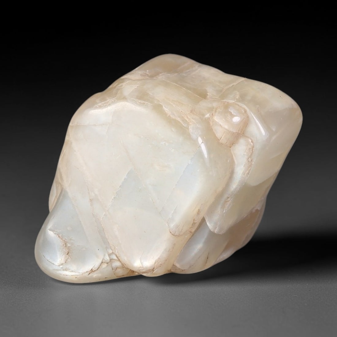 78ct Natural Ceylon Pale Cream White Moonstone Rough, 62AH: This smooth weathered moonstone rough carries soft pale cream white translucency with subtle internal silvery adularescent shimmer locked within its naturally tumbled surface, fine faint mineral veini