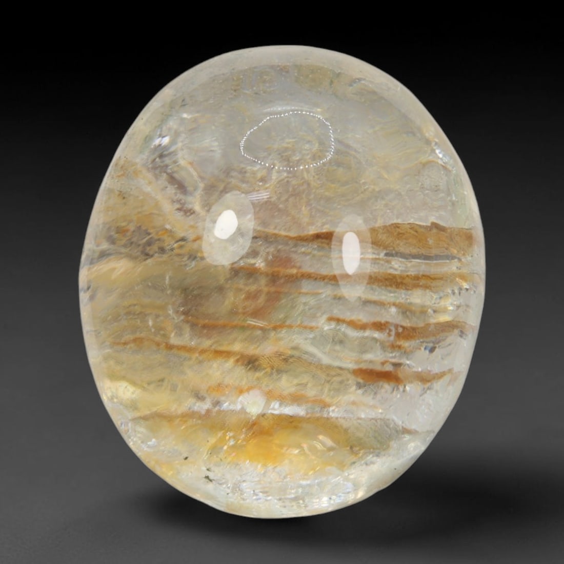 27ct Natural Brazilian Phantom Quartz Oval Cabochon Loose Gemstone, 3BM: This smoothly polished cabochon of natural phantom quartz preserves delicate layered phantom crystal formations enclosed inside transparent quartz host. The domed polished surface offers unobstructed 