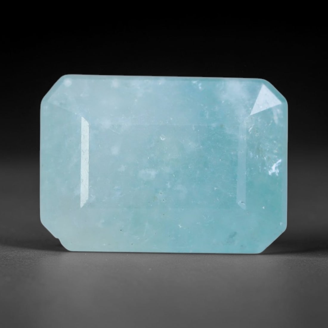 3.49ct Natural Madagascan Faceted Grandidierite Rare Loose Gemstone, 57BD: This expertly faceted finished grandidierite holds soft translucent body tone with fine faint natural internal veining visible beneath precisely cut reflective facets within its 10.3x7.3x5.9mm calibra