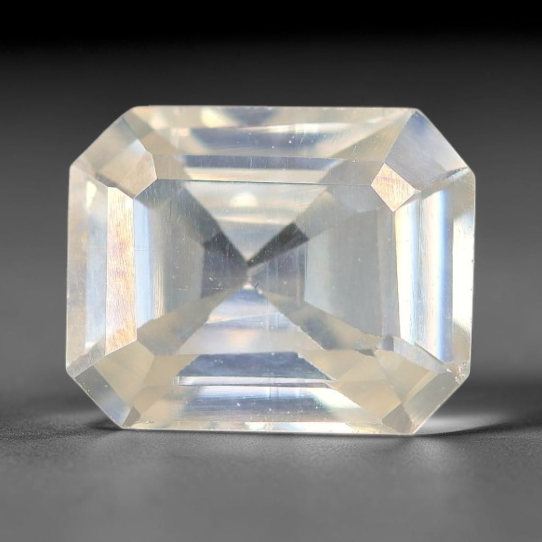 1.26 Carats Natural Cool White Moissanite Loose Gemstone, 82FM: This cool white moissanite holds dimension measurements of 8.1x6.1x3.2mm, delivering exceptional light dispersion that generates vivid rainbow sparkle across its fully transparent body, with faint mic