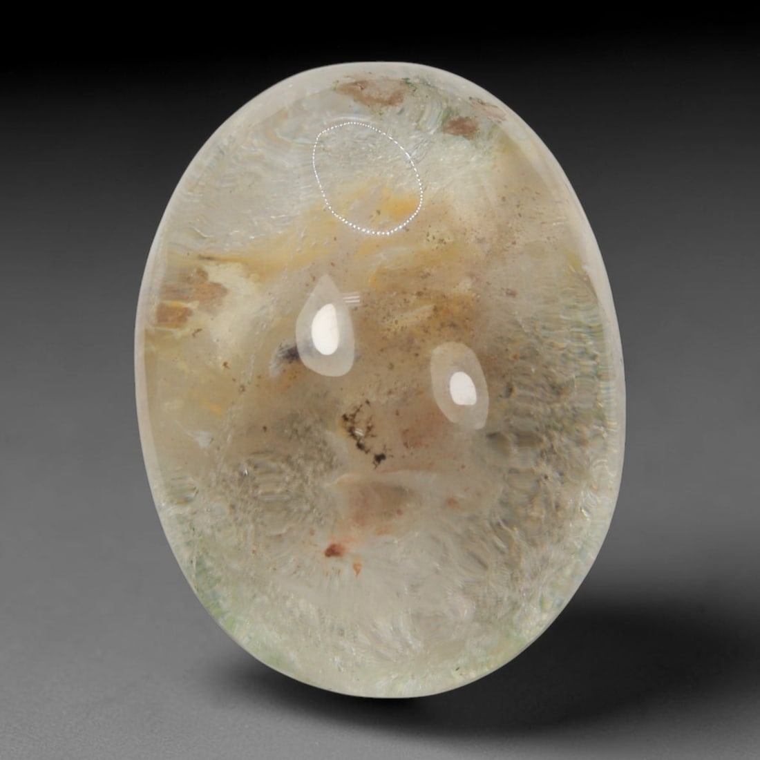 27ct Natural Brazilian Phantom Quartz Oval Cabochon Loose Gemstone, 30BM: This smoothly polished cabochon of natural phantom quartz preserves delicate layered phantom crystal formations enclosed inside transparent quartz host. The domed polished surface offers unobstructed 