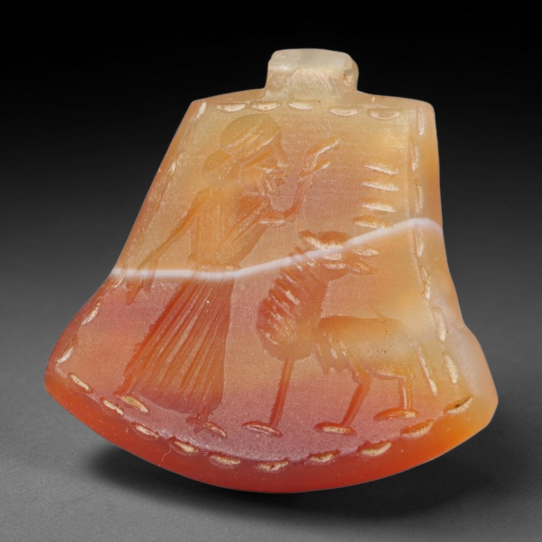 Vintage Natural Carnelian Agate Revival Indo-Persian Glyptic Figural Talisman Amulet Plaque, 72FK: This vintage talisman pendant plaque is skillfully carved from natural banded carnelian agate, crafted in a style referencing ancient Indo-Persian glyptic art traditions. The face bears detailed relie