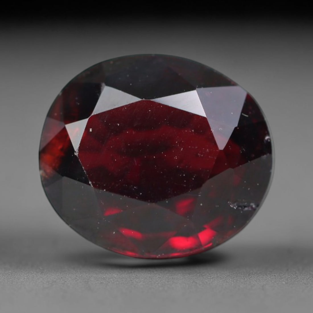 4.51ct Natural Mozambican Deep Crimson Red Faceted Almandine Garnet Loose Gemstone, 90BC: This meticulously faceted garnet features a dense, rich red crystalline body dotted with subtle micro mineral inclusions scattered evenly throughout its transparent interior, precision-cut reflective 