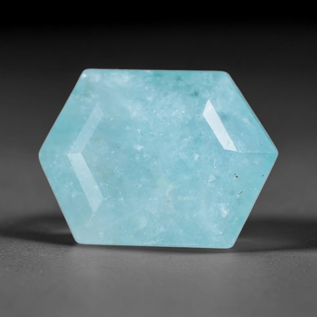 4.07ct Natural Madagascan Faceted Grandidierite Rare Loose Gemstone, 58BD: This expertly faceted finished grandidierite holds soft translucent body tone with fine faint natural internal veining visible beneath precisely cut reflective facets within its 11.8x8.9x6.1mm calibra