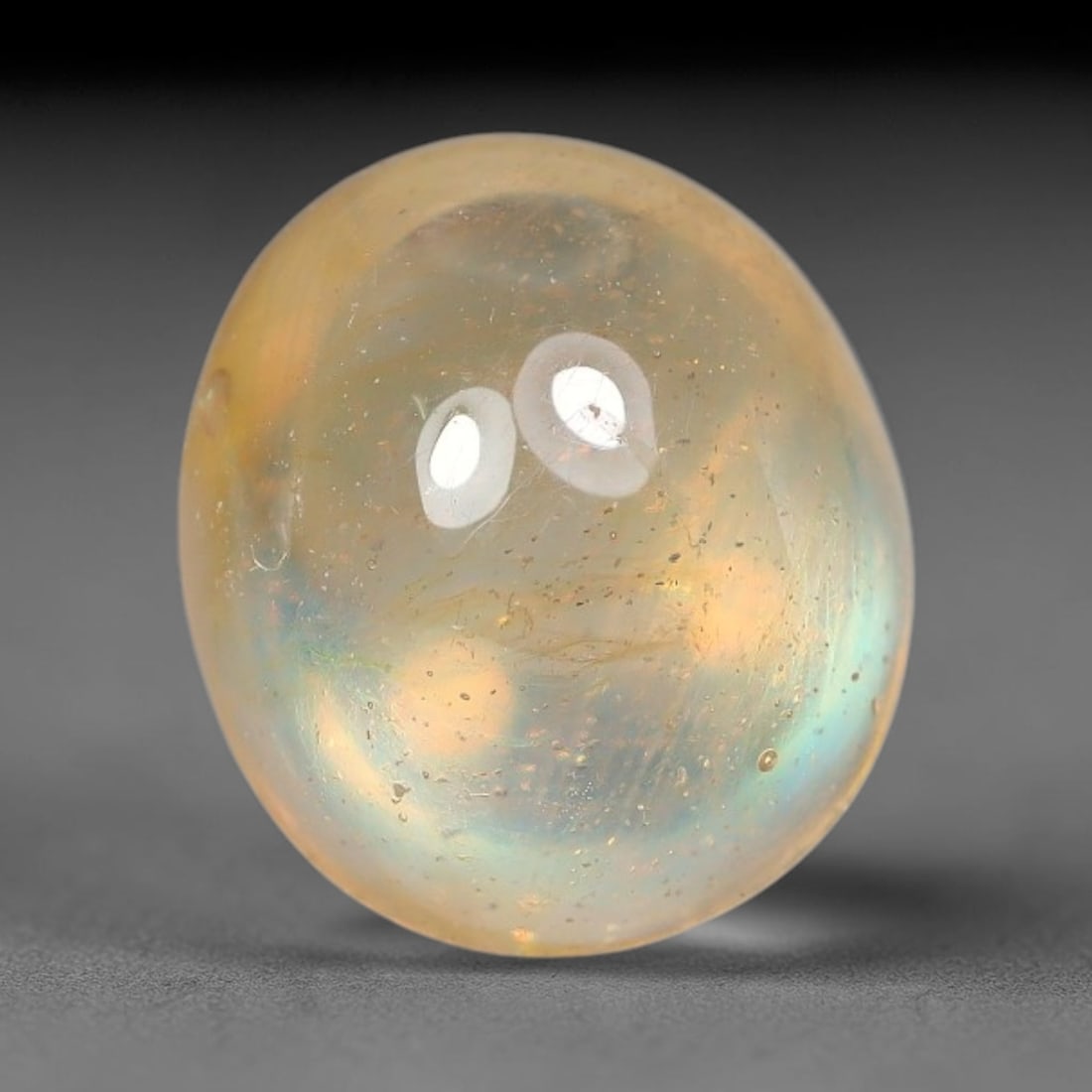 2.24ct Natural Sri Lankan Padparadscha Sapphire Loose Gemstone, 78BF: This fully polished Padparadscha sapphire features soft warm peach-orange blended body tone, with faint natural mineral traces scattered throughout its crystalline interior, measured at calibrated dim