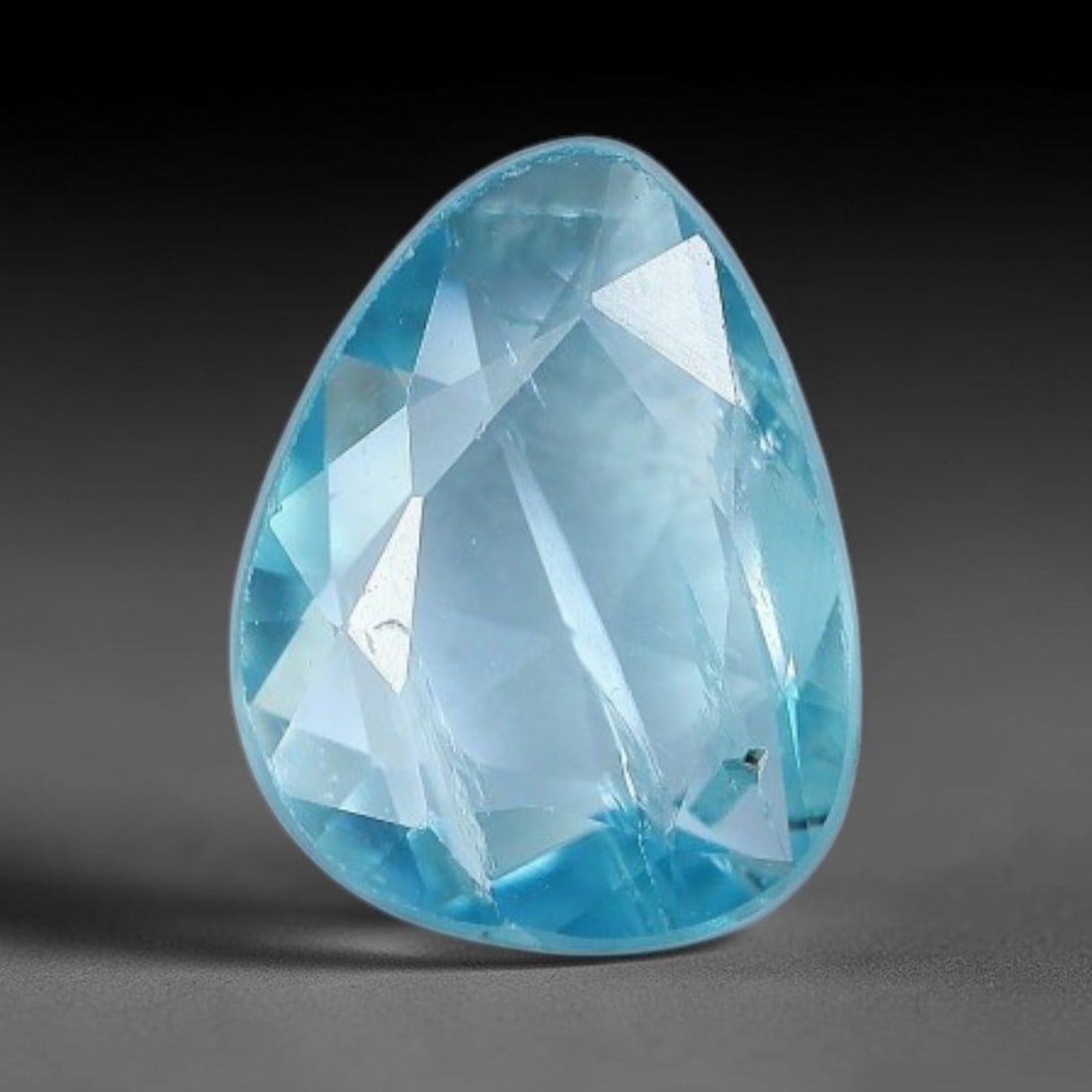 1.42ct Natural Cambodian Blue Zircon Rose Cut Loose Gemstone, 55BV: This fascinating rose cut gemstone is natural blue zircon sourced from Cambodia. The vintage-inspired rose cut facets create soft, diffused light return that beautifully showcases its vivid saturated 