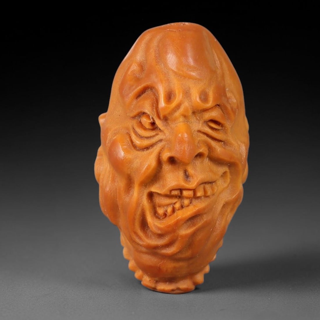 A Chinese Carved Natural Olive Nut Drilled Art Bead, 27BZ: Traditional craft bead carved from solid natural olive nut core, representing a classic miniature Chinese micro-carving folk art piece with a pre-drilled suspension bore integrated for easy threading 