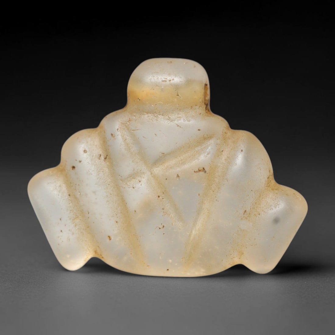 Ancient Medieval Coptic Christian Egyptian Culture Rock Crystal Amulet (300-1000 CE), 97FY: This antique rock crystal amulet originates from Coptic Christian Egyptian Culture, a region with a long-standing tradition of crafting translucent hardstone talismans for devotional and funerary use.