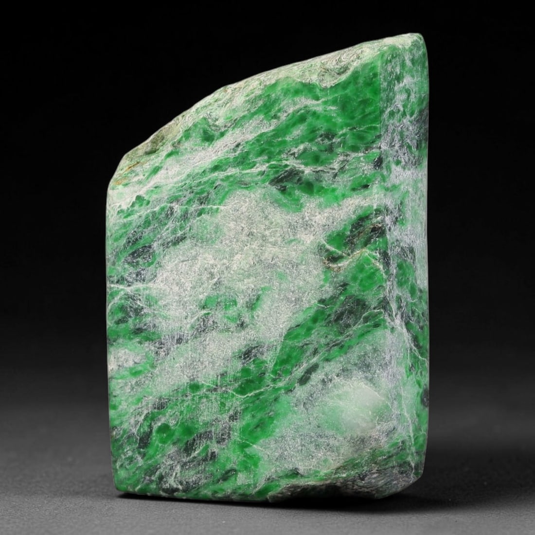 259ct Natural Type A Burmese Jadeite Jade Sliced Rough, 51FB: This specimen is a sliced rough block of natural Type A Burmese jadeite jade. The interior displays natural colour zoning with visible mineral veining and crystalline patterns typical of unprocessed j