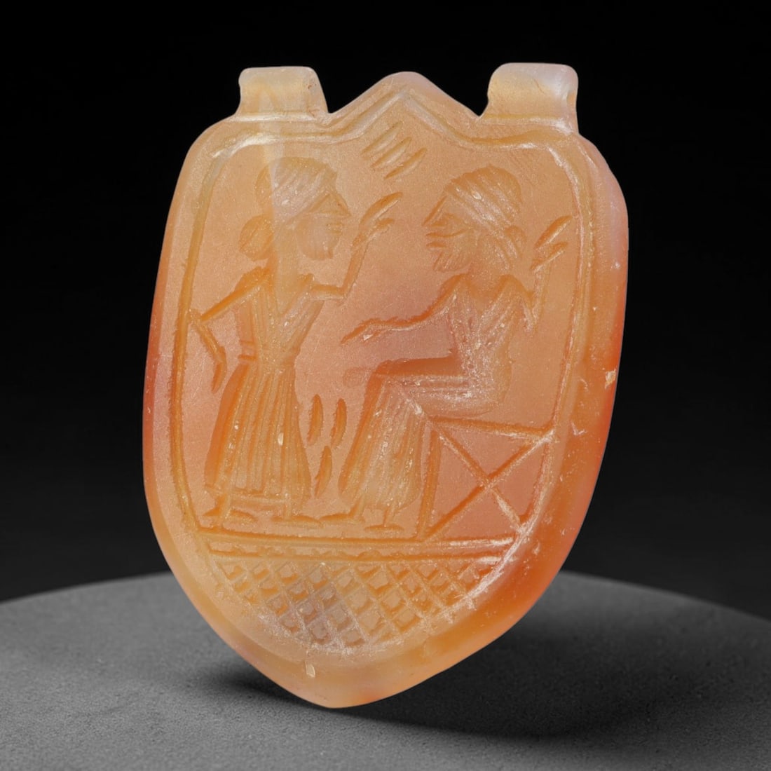 Vintage Natural Carnelian Agate Revival Indo-Persian Glyptic Figural Talisman Amulet Plaque, 47FL: This vintage talisman pendant plaque is skillfully carved from natural banded carnelian agate, crafted in a style referencing ancient Indo-Persian glyptic art traditions. The face bears detailed relie