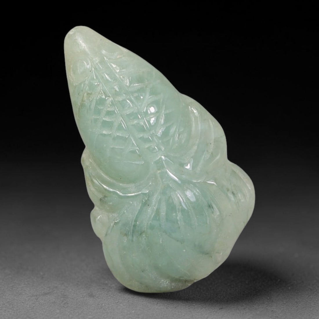 Natural Burmese Type A Jadeite Jade Hand Carved Pendant, 72BL: Artisan hand-carved untreated Burmese Type A jadeite jade pendant measuring 31x19 mm. Carefully sculpted with detailed relief craftsmanship and finished with a smooth glossy polish. Authentic Type A j