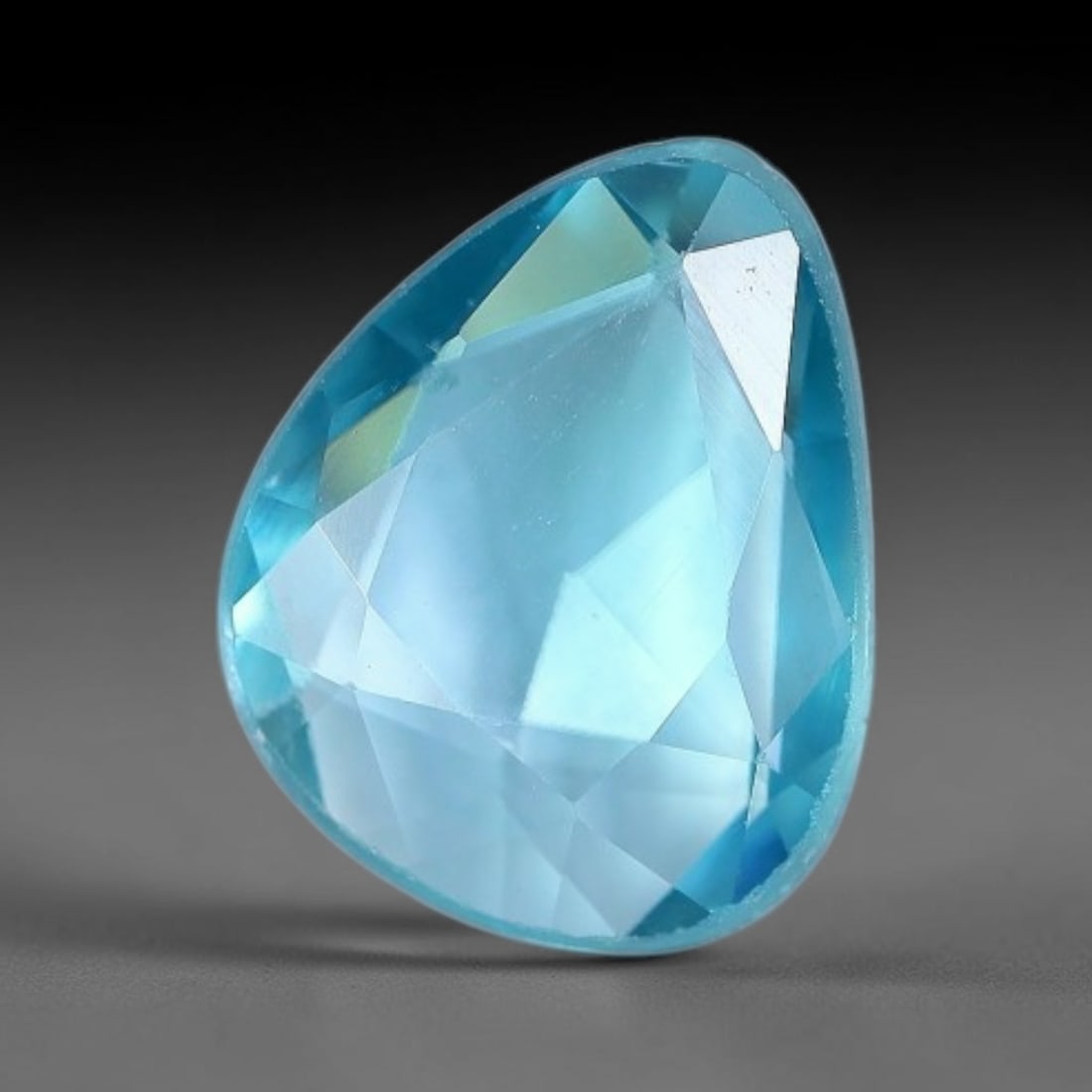 1.88ct Natural Cambodian Blue Zircon Rose Cut Loose Gemstone, 60BV: This fascinating rose cut gemstone is natural blue zircon sourced from Cambodia. The vintage-inspired rose cut facets create soft, diffused light return that beautifully showcases its vivid saturated 