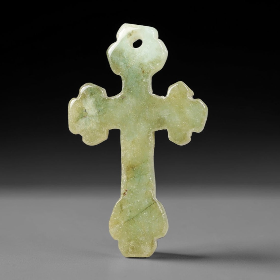 Natural Burmese Type A Jadeite Jade Christian Cross Pendant, 4BT: Hand crafted untreated Burmese Type A jadeite jade cross pendant measuring 34x20 mm, shaped into a classic Christian cross silhouette with tapered pointed terminals. The stone features a smooth polish