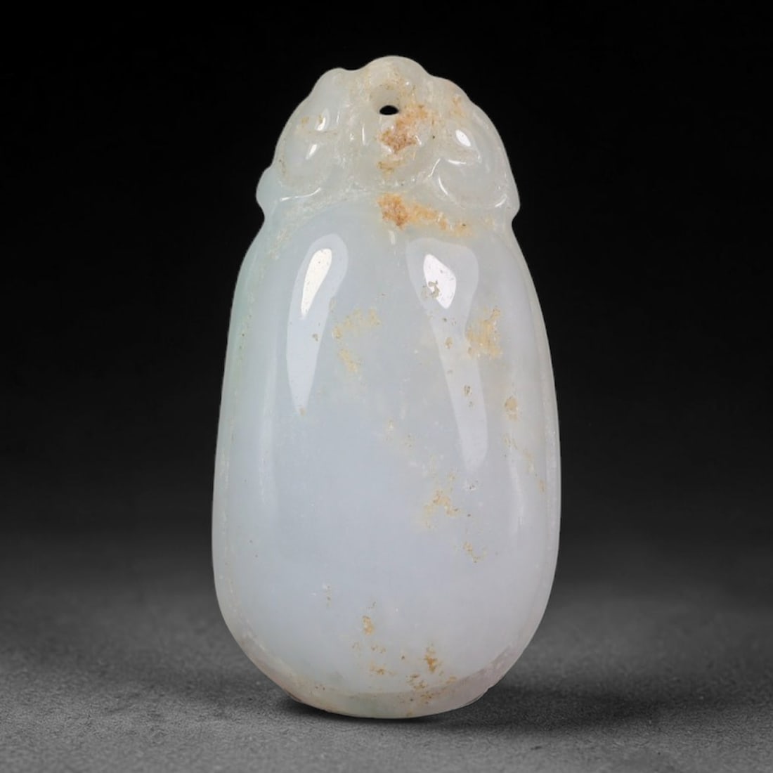 Natural Vintage Burmese Type A Jadeite Jade Plain Melon Gourd Pendant, 62AA: Hand-carved vintage wearable pendant crafted from untreated natural Burmese Type A jadeite jade, measuring 3cm x 1.5cm. The piece features a smooth solid elongated melon gourd silhouette with minimali