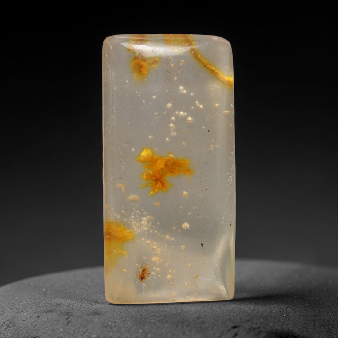 5.87ct Natural Baltic Amber Cabochon with Fossil Insect Inclusions Loose Gemstone, 42BY: This polished cabochon is genuine natural Baltic amber, featuring well-preserved fossilised ancient insect inclusions suspended within its warm golden-yellow resin matrix. Subtle organic plant debris 