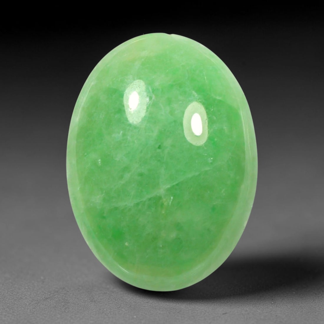 6.13ct Natural Burmese Type A Apple Green Jadeite Jade Cabochon, 84BP: This single loose natural Burmese Type A jadeite jade cabochon with exact dimensions of 16.3x12.2x3.8mm. It is completely untreated, free of artificial dye, bleaching, or resin filling, preserving the