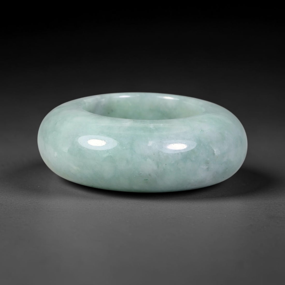 Natural Burmese Type A Jadeite Jade Wide Band Ring, 29BK: Polished untreated Burmese Type A jadeite jade wide band ring, US ring size 12.75 with a substantial band width of 13 mm. The jadeite features a soft pale mint green base naturally streaked with flowi