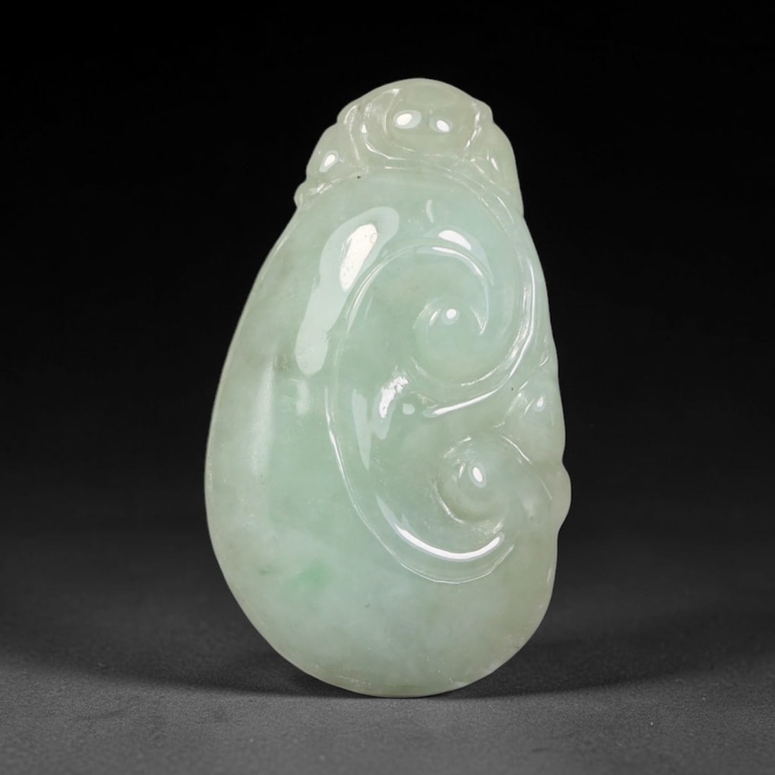 Natural Burmese Type A Jadeite Jade Hand Carved Pendant, 5BQ: Artisan hand-carved untreated Burmese Type A jadeite jade pendant measuring 26x15 mm. Carefully sculpted with detailed relief craftsmanship and finished with a smooth glossy polish. Authentic Type A j