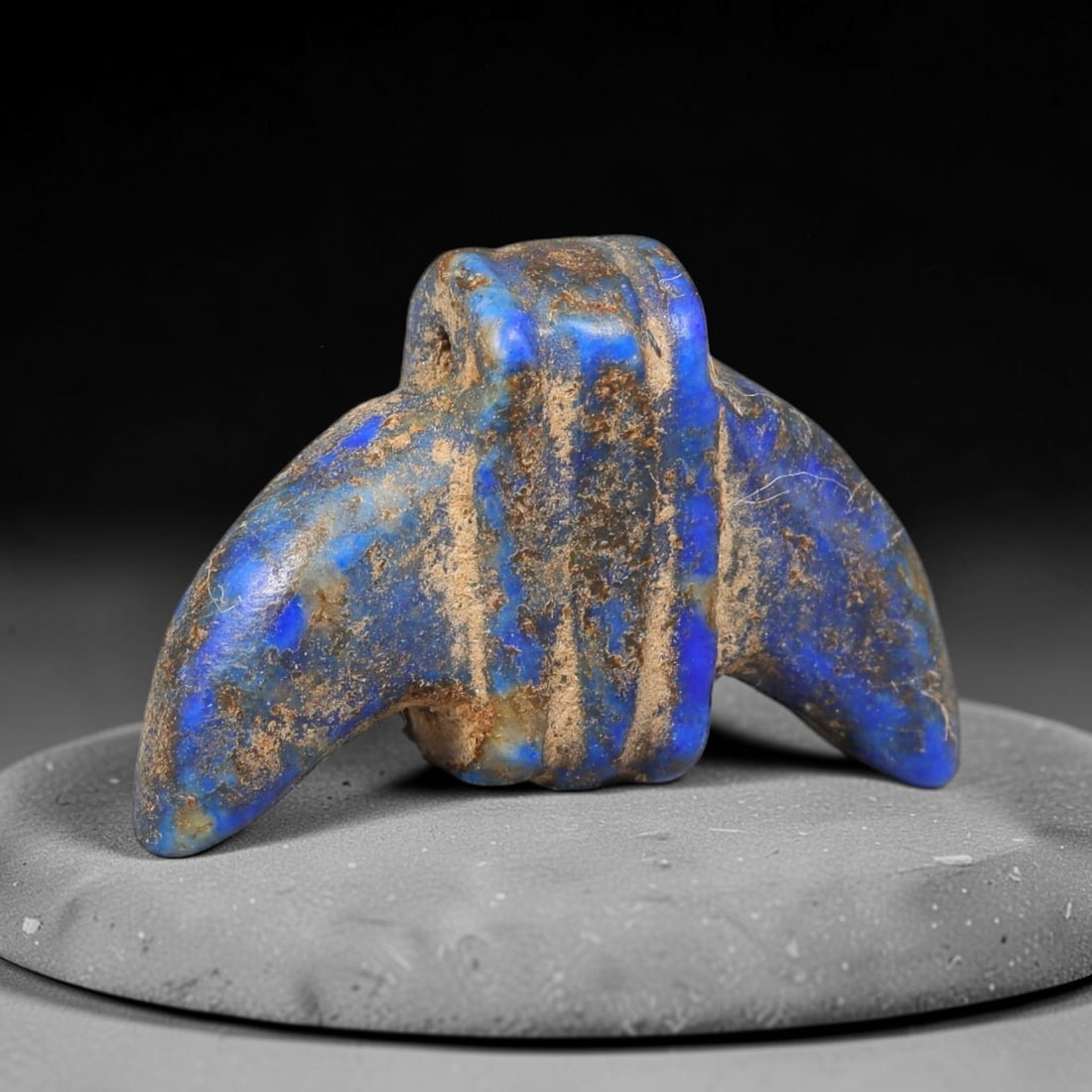 Ancient Medieval Sasanian Persian Culture Lapis Lazuli Amulet (224-651 CE), 20EC: This antique carved lapis lazuli amulet originates from Sasanian Persian Culture, a civilization famed for crafting rich blue lapis talismans sourced from Afghanistan's mining regions. The surface bea