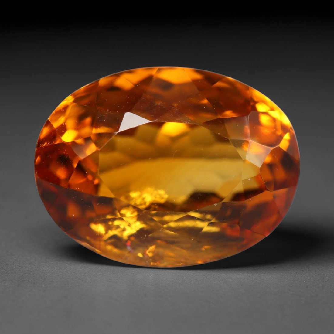 7.97ct Natural Brazilian Madeira Citrine Oval Faceted Loose Gemstone, 97BZ: This expertly cut oval faceted gemstone is natural Madeira citrine sourced from Brazil. It exhibits rich, saturated deep golden-orange tone characteristic of premium Madeira citrine, with crisp facets