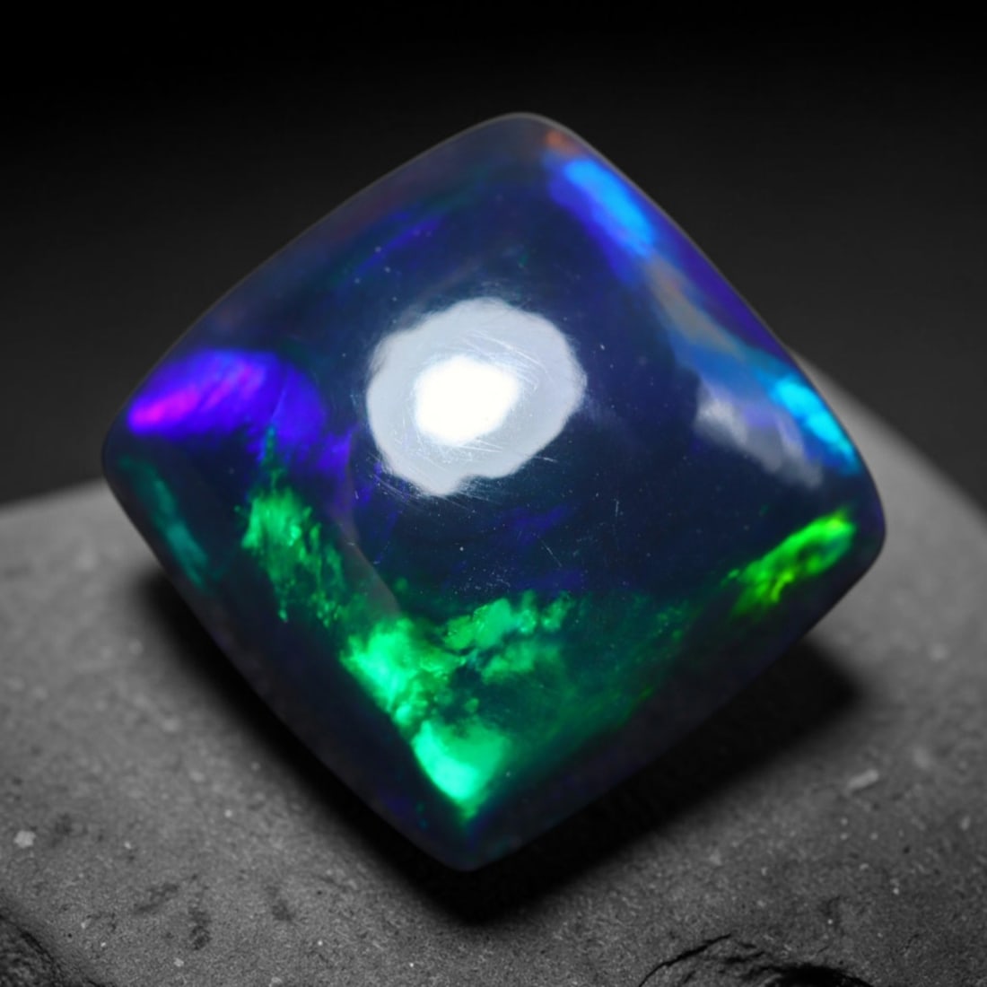 3.02ct Natural Ethiopian Welo Black Smoked Opal Cabochon Loose Gemstone, 39BY: This fully polished Ethiopian Welo opal features a dark smoked base with vivid, sweeping play-of-color shifting across its glossy dome surface, measured at 9x5mm. The black smoke treatment deepens the