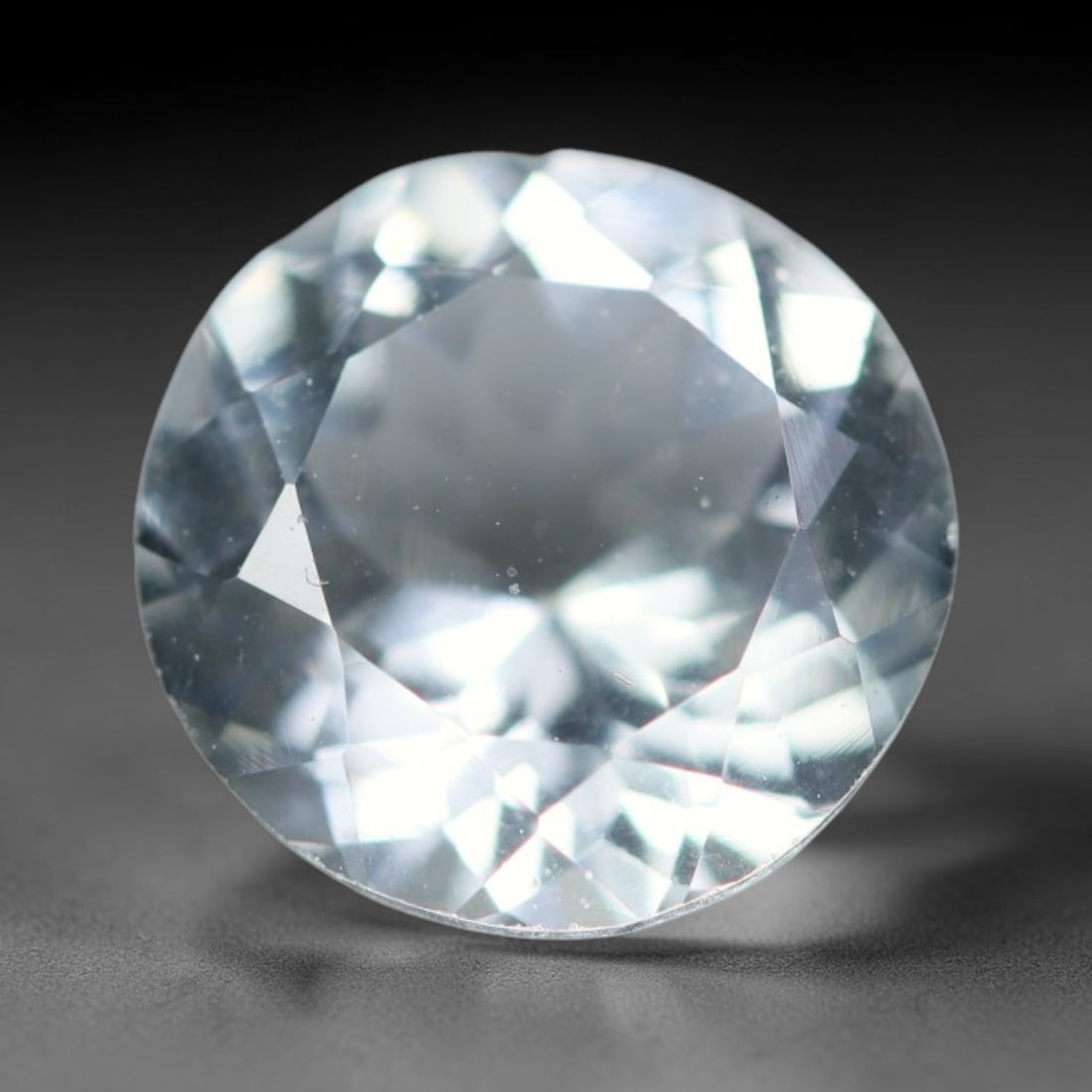 2.43ct Natural Brazilian Sky Blue Faceted Aquamarine Loose Gemstone, 97BD: This precisely faceted aquamarine boasts clear translucent pale sky blue body tone with subtle thin mineral needle and tiny scattered crystalline specks visible within its polished reflective planes i