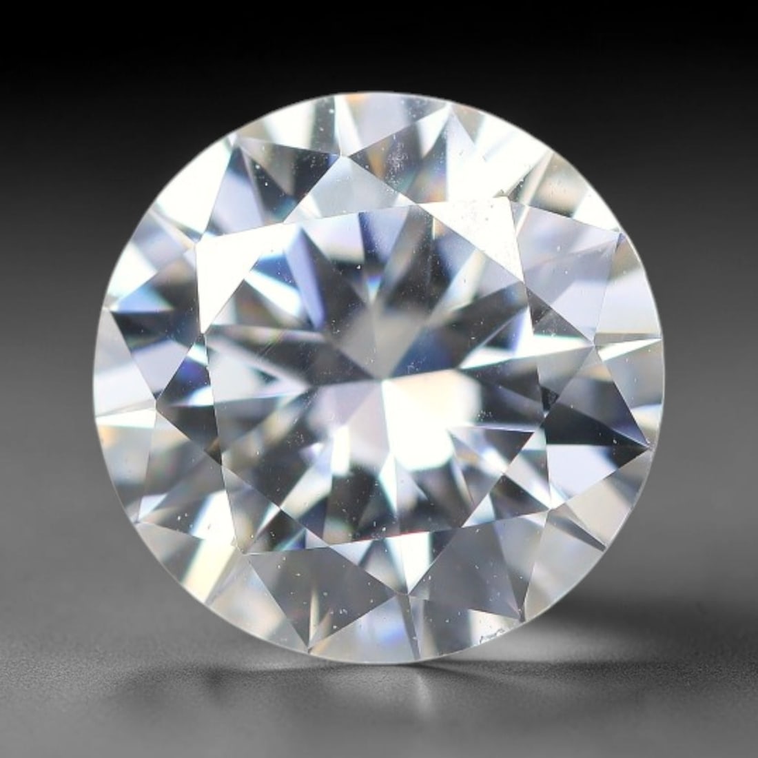 0.93 Carats Natural Clear White Moissanite Loose Gemstone, 23FL: This clear white moissanite carries dimension specs of 5.6x3.8mm, exhibiting outstanding light dispersion that produces vivid, multi-faceted sparkle across its transparent body, with sparse tiny micro