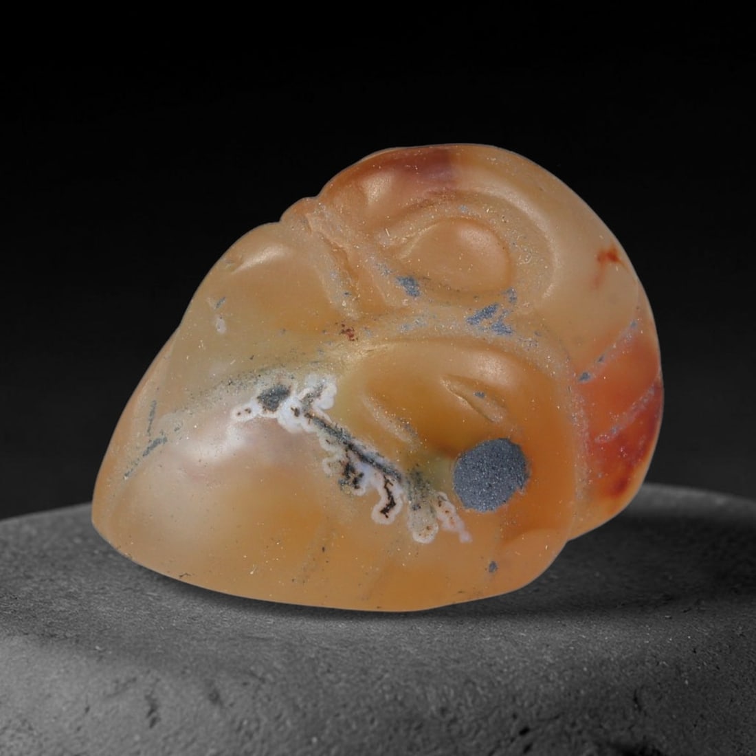 Ancient Sasanian Persian Agate Duck Amulet Bead (224-651 CE), 24EC: This antique duck-shaped amulet bead carved from natural agate originates from the Sasanian Persian Empire. Avian zoomorphic talismans represented vitality, transition and spiritual protection within 