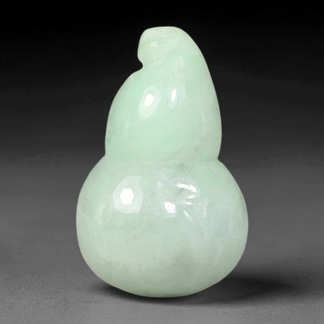 Natural Burmese Type A Jadeite Jade Hand Carved Pendant, 71BS: Artisan hand-carved untreated Burmese Type A jadeite jade pendant measuring 18x12 mm. Carefully sculpted with detailed relief craftsmanship and finished with a smooth glossy polish. Authentic Type A j