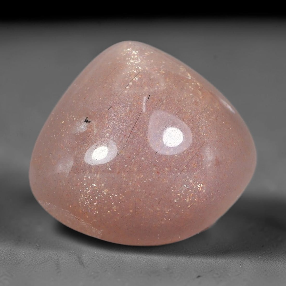 9.33 Carats Natural Ceylon Soft Peach Pink Moonstone Cabochon Loose Gemstone, 11AG: This warm soft peach pink moonstone features delicate sparkling mineral flecks scattered throughout its smooth surface paired with faint flowing adularescent glow, measured at 15.3x14x6.8mm, its gentl