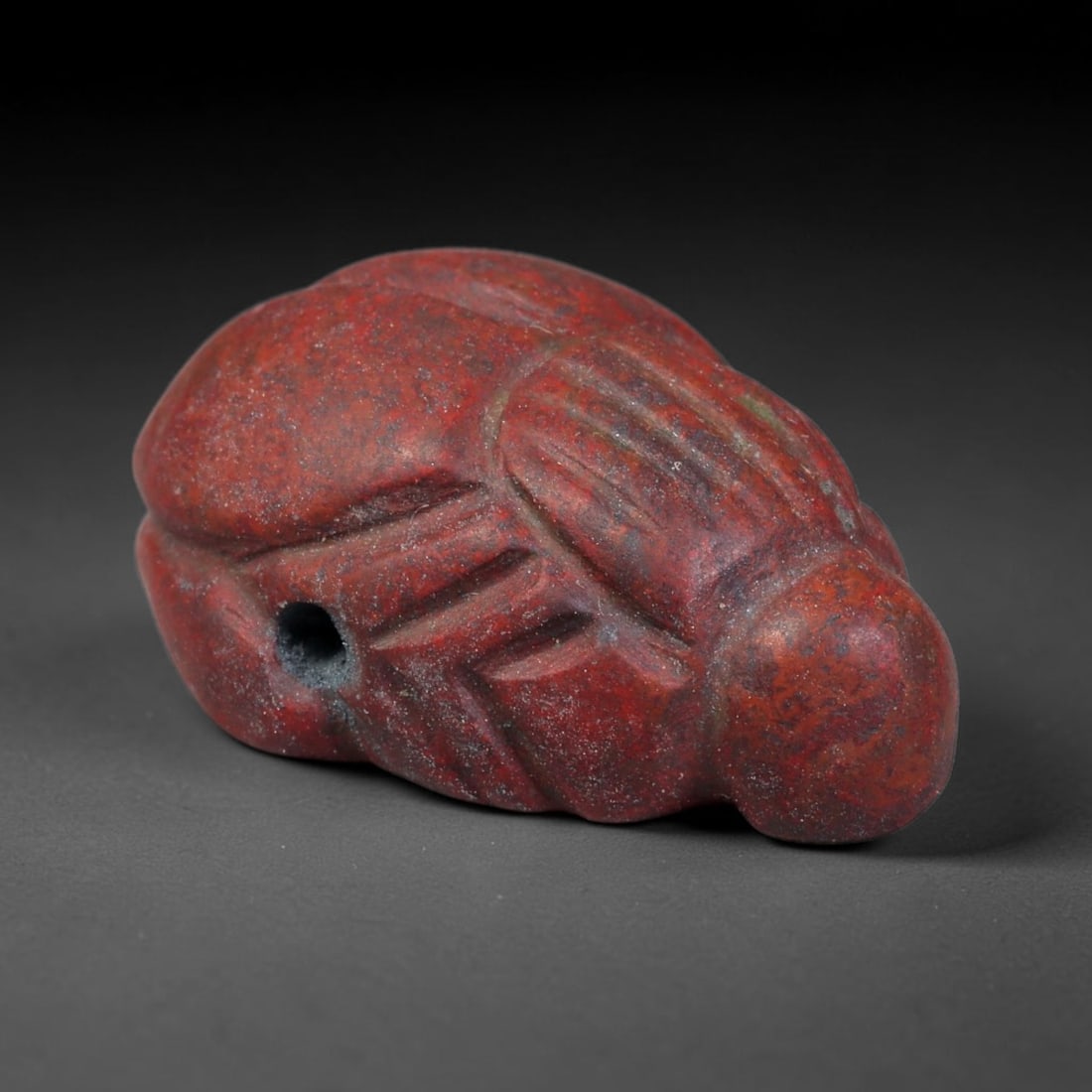 Ancient Egyptian Pharaonic Civilization Red Jasper Scarab Amulet (4000 BCE-30 CE), 21EC: This carved red jasper scarab amulet originates from Ancient Egyptian Pharaonic Civilization, crafted as a sacred talisman symbolising rebirth, protection and good fortune for both the living and fune