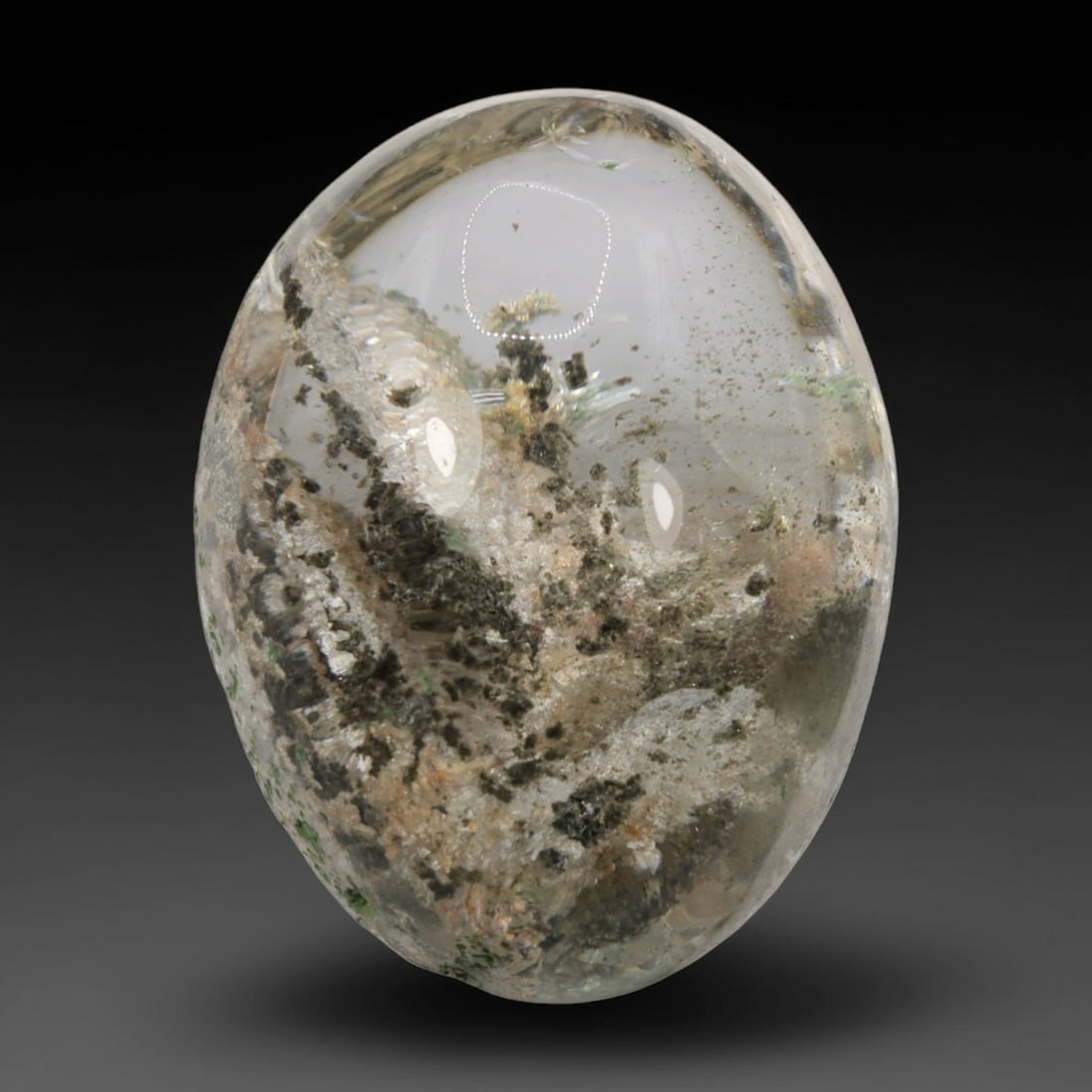 33ct Natural Brazilian Phantom Quartz Oval Cabochon Loose Gemstone, 4BM: This smoothly polished cabochon of natural phantom quartz preserves delicate layered phantom crystal formations enclosed inside transparent quartz host. The domed polished surface offers unobstructed 