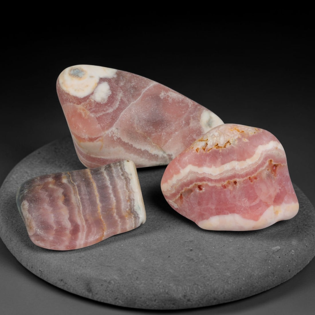 59ct 3pcs Natural Argentine Rhodochrosite Banded Tumbled Rough Set, 7FD: This listing features three individual tumbled rhodochrosite rough pieces sourced from Argentina Capillitas deposits, each showcasing distinct layered banding of soft rose pink, cream white and pale t