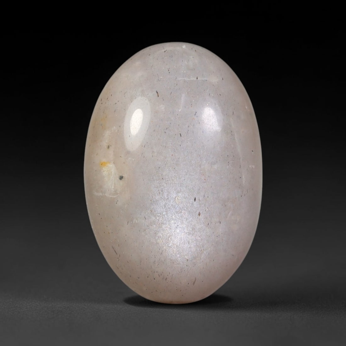 24.26ct Natural Ceylon Grey Moonstone Cabochon Loose Gemstone, 14FY: This natural Ceylon moonstone cabochon carries a soft grey body showcasing classic adularescence. Fine mineral inclusions are visible within the gem. Dimensions measure 22x15x9mm, mined in Sri Lanka, 