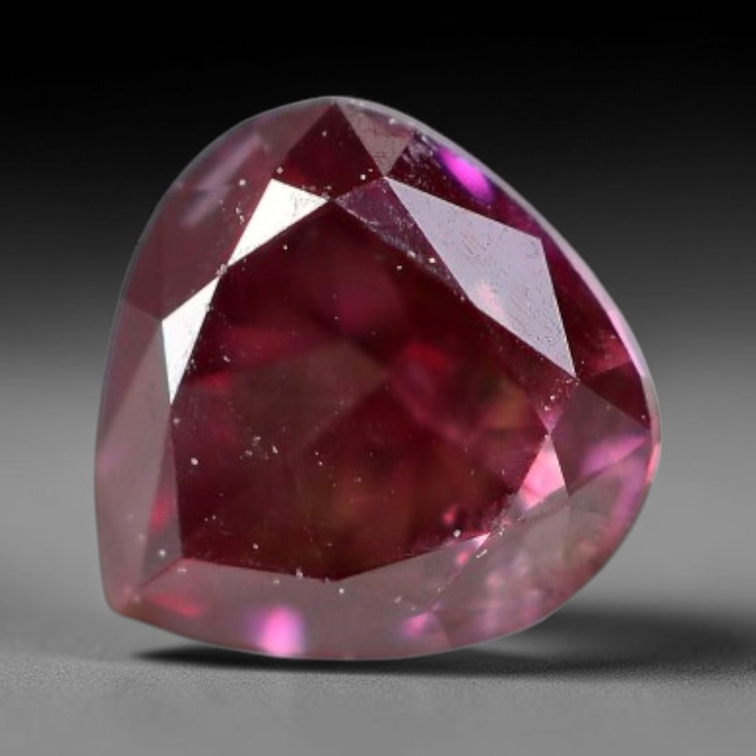 0.17ct Natural Fancy Pinkish Purple Diamond Loose Gemstone, 13BG: This polished natural diamond displays rich pinkish-purple body saturation, with subtle fine microscopic mineral specks distributed within its crystal interior, measured at calibrated dimensions of 3.