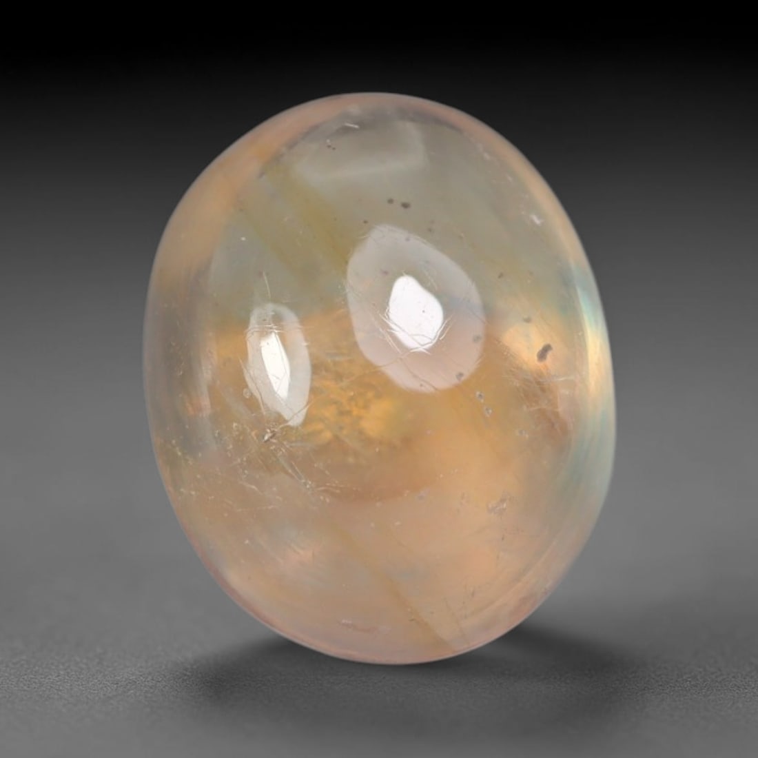 3.24ct Natural Sri Lankan Padparadscha Sapphire Loose Gemstone, 32BA: This fully polished Padparadscha sapphire features soft warm peach-orange blended body tone, with faint natural mineral traces scattered throughout its crystalline interior, measured at calibrated dim