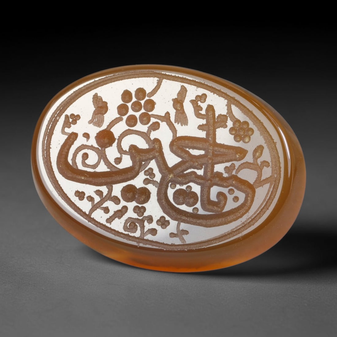 Vintage Mid-Century Carnelian Agate Islamic Calligraphic Intaglio Seal Cabochon Talisman, 7EM: This vintage mid-century natural carnelian agate intaglio seal cabochon draws inspiration from historic Islamic lapidary traditions, crafted as a wearable talisman and seal blank for jewelry setting. 