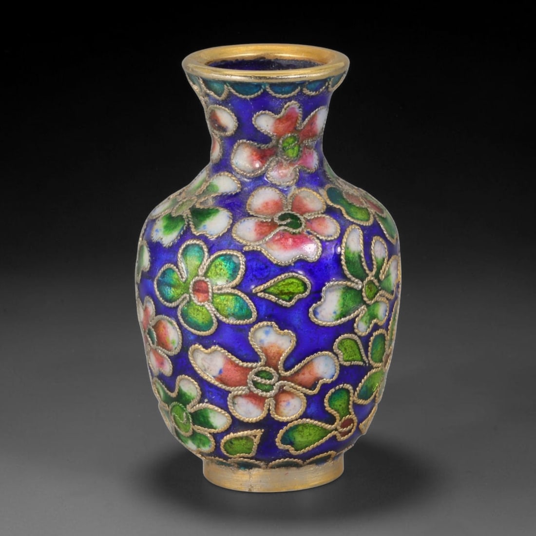 Vintage Chinese Copper Cloisonne Mini Vase - Pink Green Floral Blue Enamel Vessel, 38AR: Crafted from copper base metal with gilded cloisonne wire filigree and hand-fired polychrome enamel glazes. The miniature bulbous baluster vase features a deep cobalt blue enamel ground across flared 