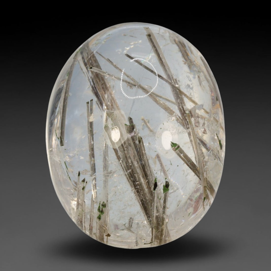 19ct Natural Brazilian Black Rutile Quartz Cabochon Loose Gemstone, 73BM: This polished cabochon of natural rutile quartz features countless distinct slender black rutile needle inclusions suspended within the clear quartz host crystal. The smooth domed surface enables full