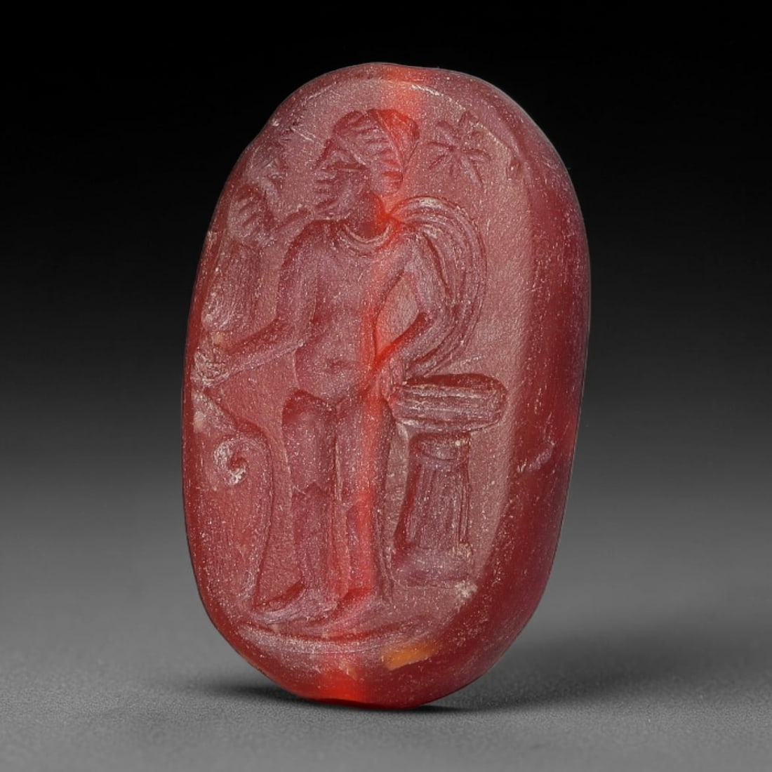 Antique Natural Carnelian Neo-Classical Figural Intaglio Seal Cabochon, 69FK: This antique intaglio seal is carved from natural carnelian agate, executed in the refined Neo-Classical glyptic style. The oval stone bears finely incised classical figural composition, designed to s