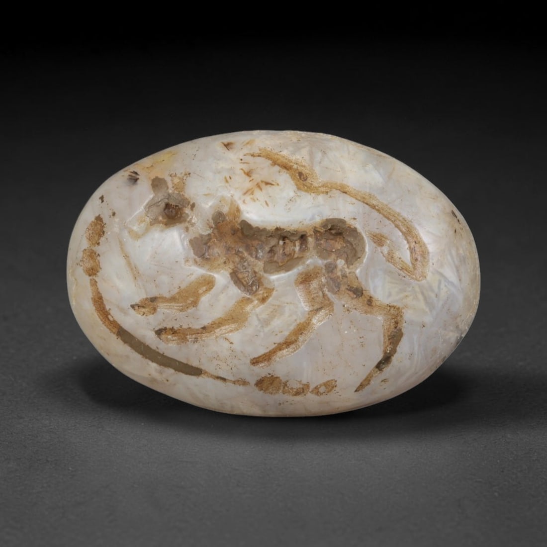 Ancient Sasanian Persian Agate Intaglio Bead (224-651 CE), 83ED: This antique agate intaglio bead originates from the Ancient Sasanian Persian civilisation, widely fashioned as wearable seal stones and protective personal talismans throughout late antiquity Western