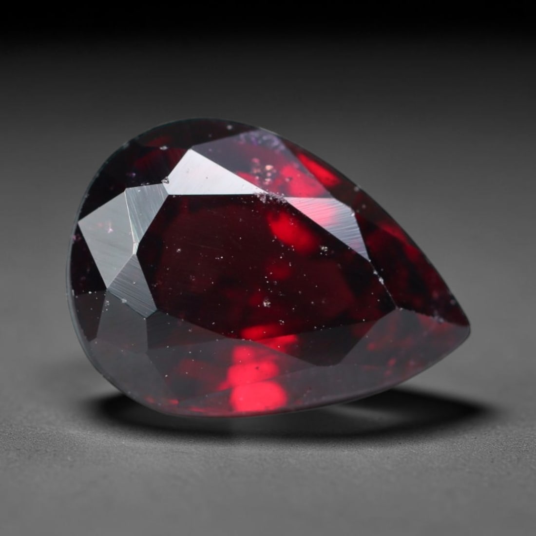 4.10ct Natural Mozambican Deep Crimson Red Faceted Almandine Garnet Loose Gemstone, 69BD: This meticulously faceted garnet features a dense, rich red crystalline body dotted with subtle micro mineral inclusions scattered evenly throughout its transparent interior, precision-cut reflective 
