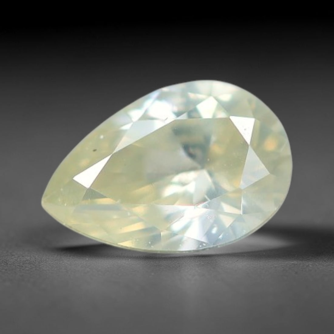 0.17ct Untreated Natural Fancy Diamond Loose Gemstone, 76BH: This fully polished untreated natural fancy diamond features inherent internal mineral markings characteristic of natural diamond formation, measured at calibrated dimensions of 4.5x3x1.9mm. Precision