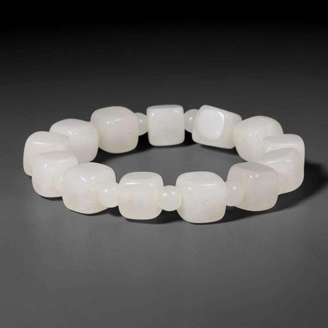 Natural Burmese Type A Jadeite Jade Beaded Bracelet, 41BK: Hand-strung bracelet crafted from polished untreated Burmese Type A jadeite jade beads. Every bead features smooth refined polishing with clean centered drill holes for sturdy flexible stringing. Auth