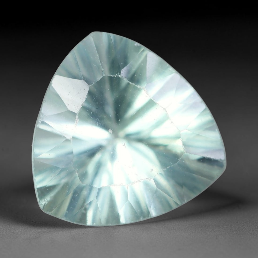 4.16ct Natural Brazilian Prasiolite Loose Gemstone, 59BE: This fully polished prasiolite presents a gentle pale mint-green body tone, with subtle natural internal crystalline features visible within the gem, measured at calibrated dimensions of 11x6.5mm. Car