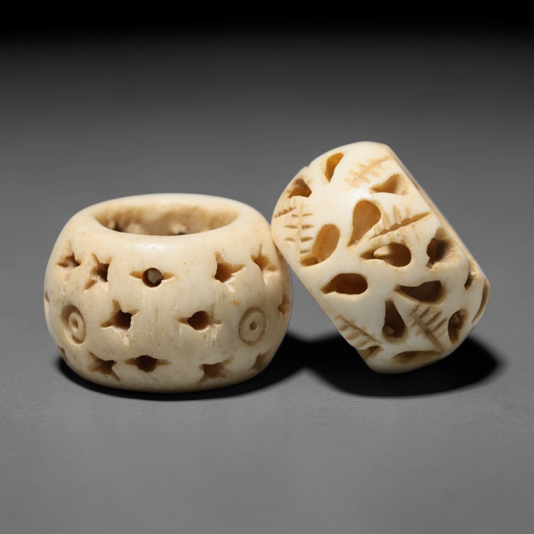Antique Sino-Siberian Steppe Nomadic Craft Stag Antler Carved Bead Pair (Post 1850s), 39FV: Pair of beads skillfully carved from natural stag antler, originating from Sino-Siberian Steppe Nomadic craft traditions, produced post 1850s. The antler material holds attractive natural aged patina,