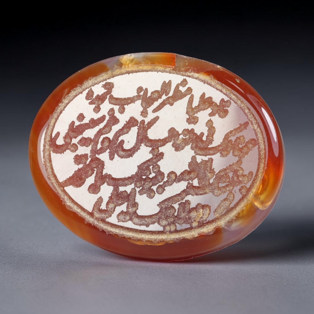 Vintage Mid-Century Carnelian Agate Islamic Calligraphic Intaglio Seal Cabochon Talisman, 11EL: This vintage mid-century natural carnelian agate intaglio seal cabochon draws inspiration from historic Islamic lapidary traditions, crafted as a wearable talisman and seal blank for jewelry setting. 
