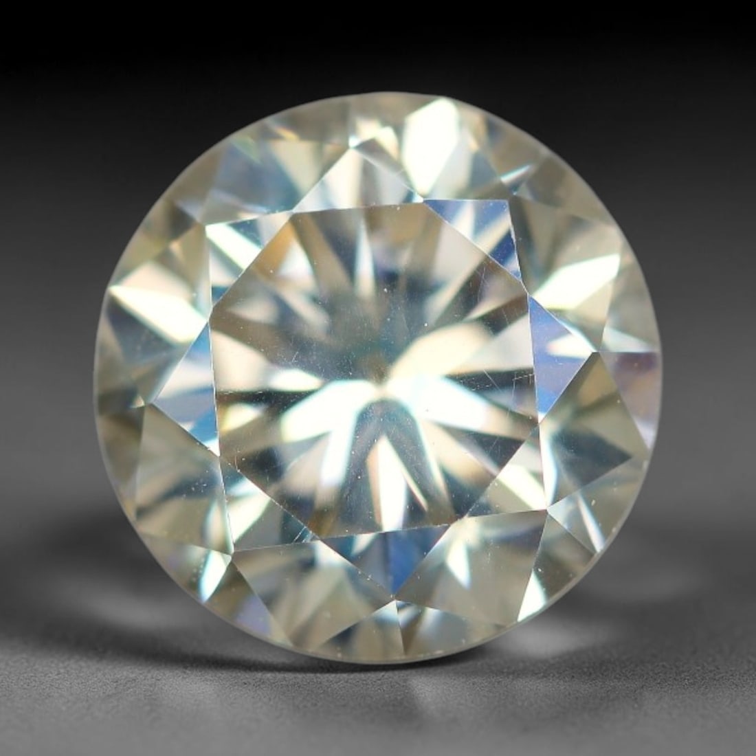 2.08 Carats Natural Cool White Moissanite Loose Gemstone, 18FP: This cool white moissanite holds dimension measurements of 8x5.3mm, delivering exceptional light dispersion that generates vivid rainbow sparkle across its fully transparent body, with faint microscop